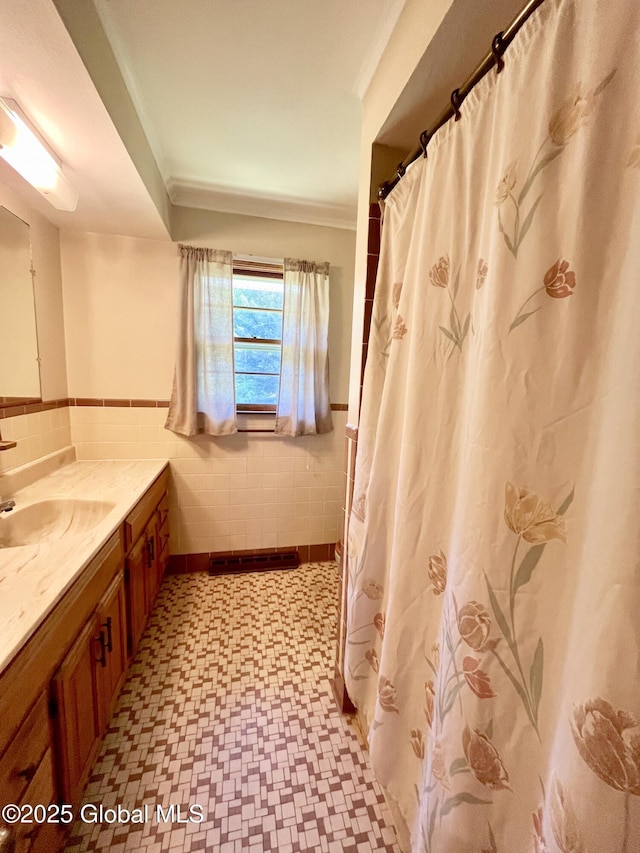 19 Lillian Dr, Glenville, NY 12302 - full bathroom with tile patterned floors, tile walls, vanity, a wainscoted wall, and a shower with curtain
