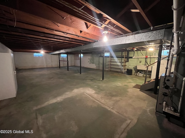 19 Lillian Dr, Glenville, NY 12302 - unfinished basement featuring stairway and a sink