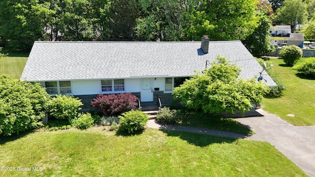 19 Lillian Dr, Glenville, NY 12302 - view of front of property featuring a shingled roof, a front yard, and a chimney
