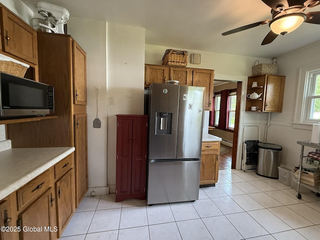 8 Hackett St, Bethlehem, NY 12158 - kitchen featuring stainless steel fridge with ice dispenser, brown cabinetry, light countertops, open shelves, and ceiling fan