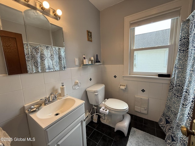 8 Hackett St, Bethlehem, NY 12158 - full bath with tile patterned flooring, vanity, tile walls, toilet, and heating unit