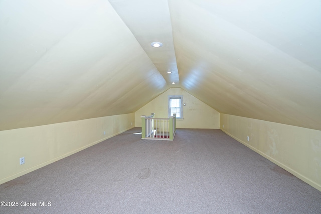 1123 Ardsley Rd, Schenectady, NY 12308 - additional living space with lofted ceiling, carpet flooring, and baseboards