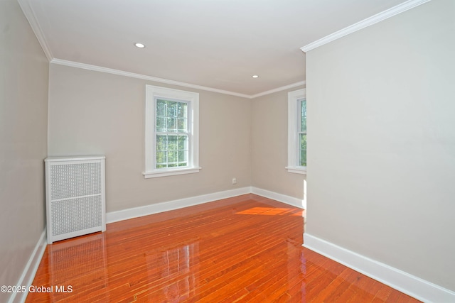 1123 Ardsley Rd, Schenectady, NY 12308 - empty room featuring wood finished floors, baseboards, crown molding, and recessed lighting