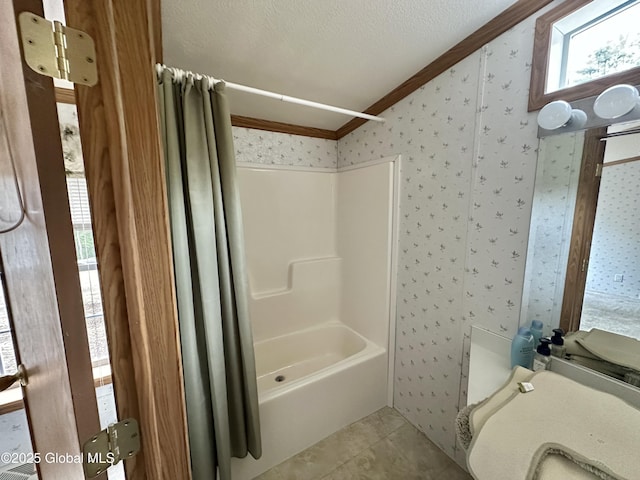 6041 Rte 9n, Hadley, NY 12835 - bathroom featuring ornamental molding, wallpapered walls, shower / bath combo, lofted ceiling, and toilet