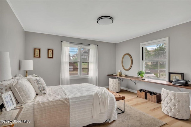55 Fairview Ave, Hudson, NY 12534 - bedroom featuring wood finished floors, ornamental molding, and baseboards