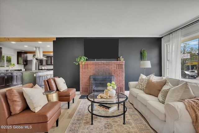 55 Fairview Ave, Hudson, NY 12534 - living room with light wood finished floors, a fireplace, and recessed lighting