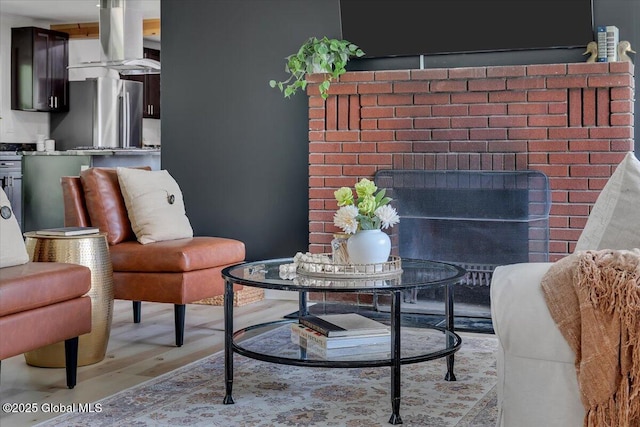 55 Fairview Ave, Hudson, NY 12534 - living area with light wood-style floors and a fireplace