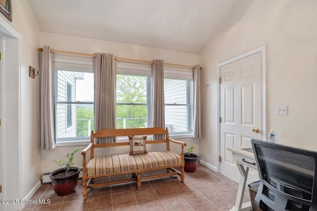 440 Posson Hill Rd, Middleburgh, NY 12122 - sitting room with healthy amount of natural light, light tile patterned floors, baseboard heating, vaulted ceiling, and baseboards