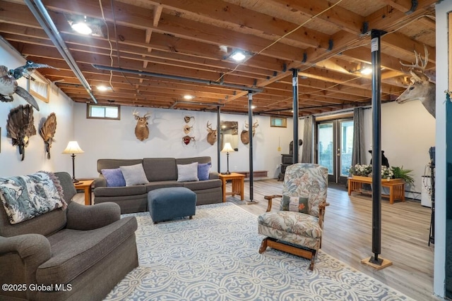 440 Posson Hill Rd, Middleburgh, NY 12122 - living area with wood finished floors and a baseboard radiator