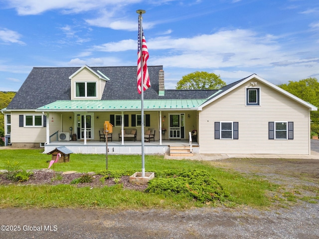 440 Posson Hill Rd, Middleburgh, NY 12122 - back of property featuring metal roof, covered porch, a chimney, and a lawn