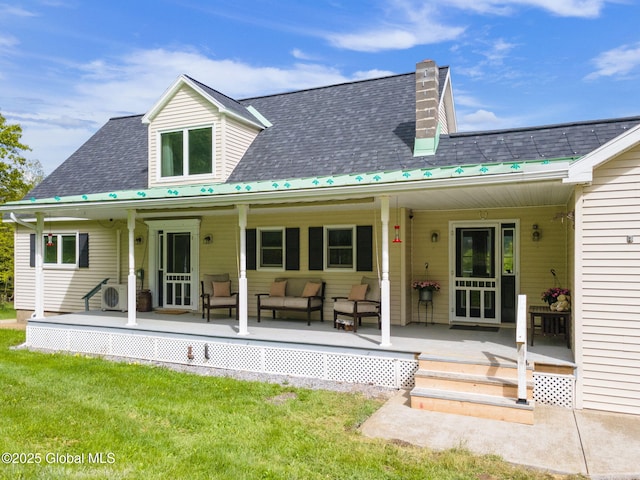 440 Posson Hill Rd, Middleburgh, NY 12122 - rear view of house featuring a yard, a porch, roof with shingles, and outdoor lounge area