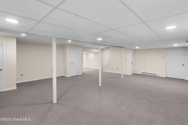 228 Vincenza Ln, Guilderland, NY 12303 - finished basement featuring a baseboard radiator, carpet, recessed lighting, and a paneled ceiling
