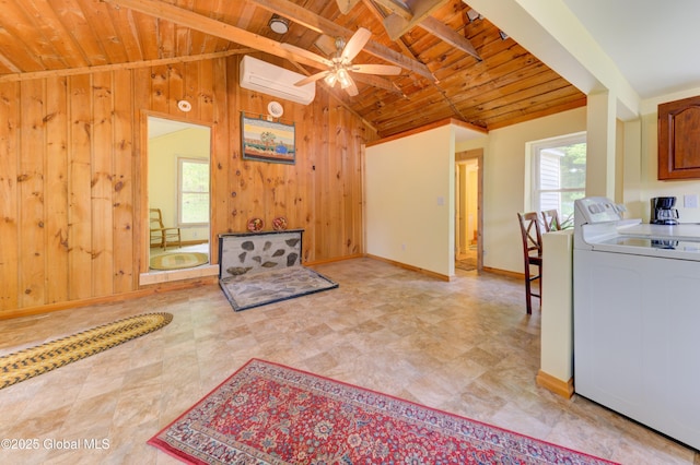 165 Lake Rd, Westerlo, NY 12023 - living area with washer / dryer, wooden ceiling, plenty of natural light, wood walls, and a wall mounted AC