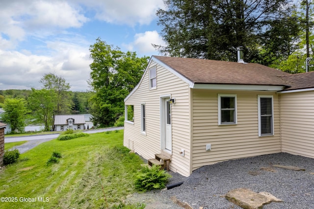 165 Lake Rd, Westerlo, NY 12023 - view of property exterior with a yard, a shingled roof, and entry steps