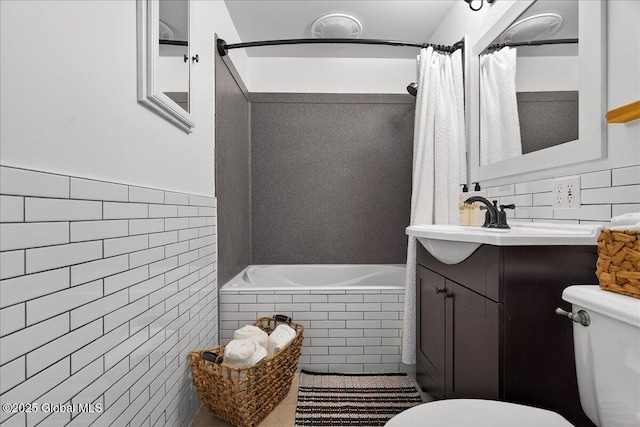 14 Grounds Pl, Colonie, NY 12205 - full bath featuring tile walls, vanity, tiled shower / bath combo, and tile patterned floors