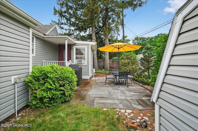 14 Grounds Pl, Colonie, NY 12205 - view of patio / terrace with cooling unit, a grill, and outdoor dining space