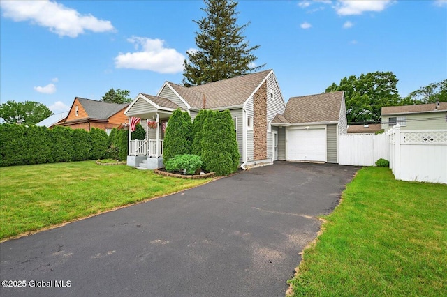 14 Grounds Pl, Colonie, NY 12205 - obstructed view of property with driveway and an attached garage