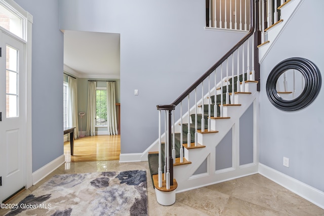 17 Brendan Ln, Niskayuna, NY 12309 - foyer entrance with stairway, baseboards, and a high ceiling