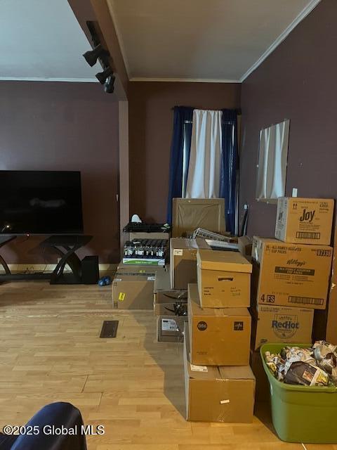 34 Haskell St, Hagaman, NY 12086 - living room featuring ornamental molding and wood finished floors
