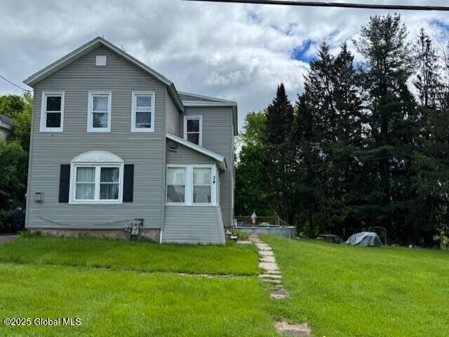 34 Haskell St, Hagaman, NY 12086 - view of front of property with a front yard