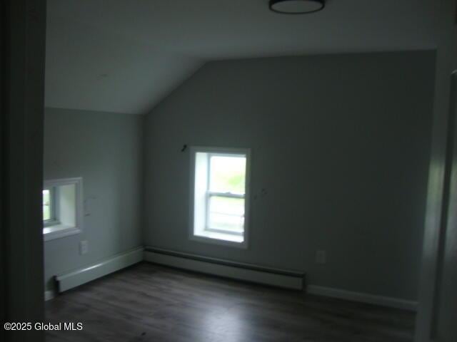 422 W Ames Rd, Canajoharie, NY 13317 - bonus room featuring a baseboard radiator, wood finished floors, lofted ceiling, and baseboards