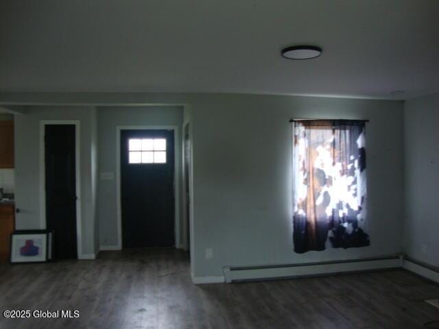 422 W Ames Rd, Canajoharie, NY 13317 - foyer featuring a baseboard heating unit, wood finished floors, and baseboards