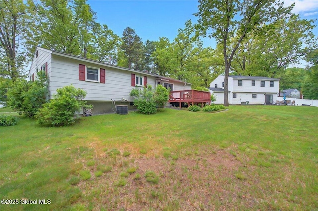 3 N Jordan Dr, Saratoga Springs, NY 12866 - rear view of house featuring a wooden deck and a yard