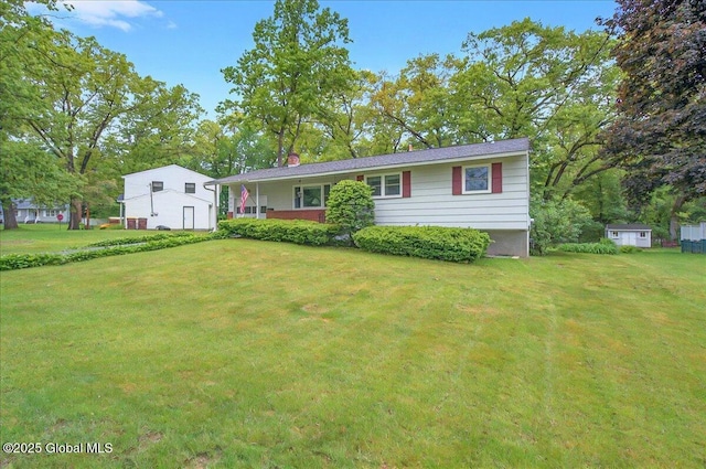 3 N Jordan Dr, Saratoga Springs, NY 12866 - view of front of property featuring a front lawn and a chimney