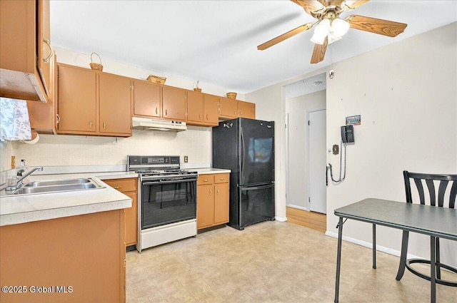 3 N Jordan Dr, Saratoga Springs, NY 12866 - kitchen featuring white range, freestanding refrigerator, under cabinet range hood, a ceiling fan, and light countertops