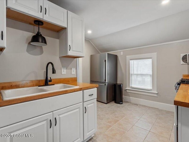2 Van Rensselear St, Saratoga Springs, Inside, NY 12866 - kitchen featuring freestanding refrigerator, a sink, vaulted ceiling, range with gas stovetop, and baseboards