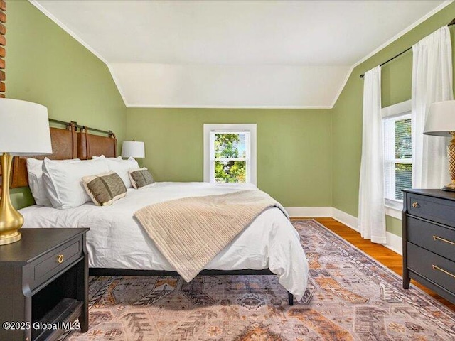 2 Van Rensselear St, Saratoga Springs, Inside, NY 12866 - bedroom with vaulted ceiling, multiple windows, baseboards, wood finished floors, and crown molding