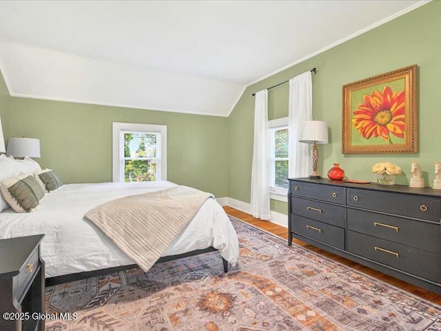 2 Van Rensselear St, Saratoga Springs, Inside, NY 12866 - bedroom featuring multiple windows, wood finished floors, vaulted ceiling, baseboards, and ornamental molding
