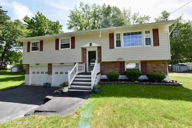 23 Bayberry Dr, Halfmoon, NY 12065 - split foyer home with brick siding, a front lawn, driveway, and a garage