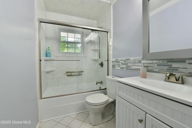 23 Bayberry Dr, Halfmoon, NY 12065 - full bath featuring toilet, vanity, tile patterned flooring, combined bath / shower with glass door, and crown molding