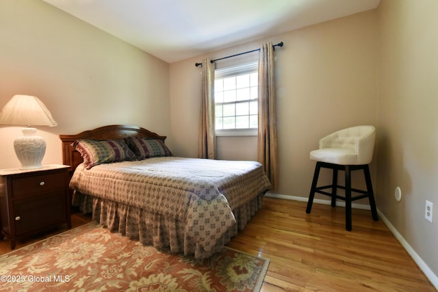 23 Bayberry Dr, Halfmoon, NY 12065 - bedroom with light wood finished floors and baseboards
