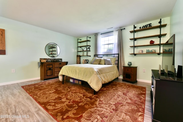 23 Bayberry Dr, Halfmoon, NY 12065 - bedroom featuring wood finished floors and baseboards