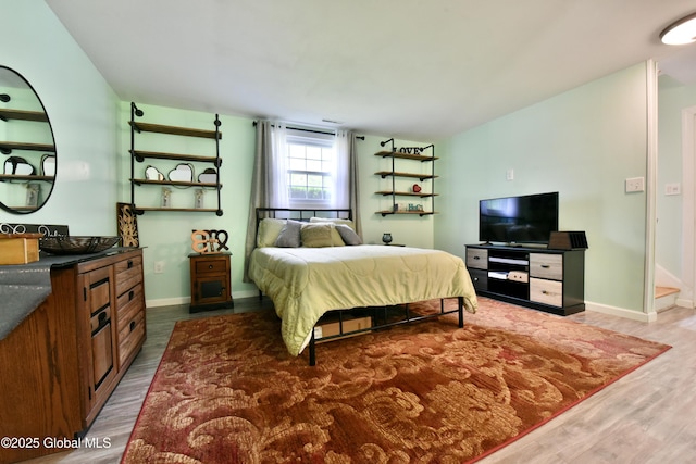 23 Bayberry Dr, Halfmoon, NY 12065 - bedroom with wood finished floors and baseboards