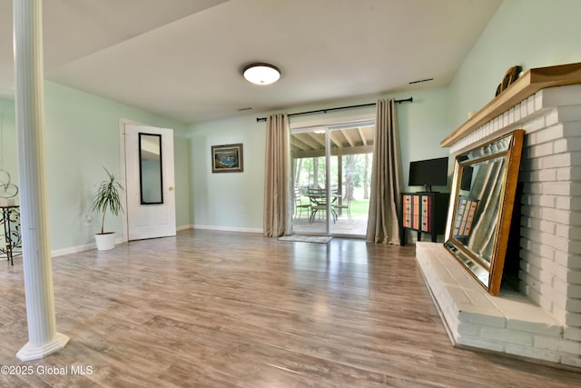 23 Bayberry Dr, Halfmoon, NY 12065 - unfurnished living room featuring wood finished floors and baseboards
