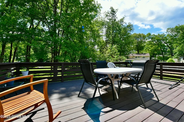 23 Bayberry Dr, Halfmoon, NY 12065 - wooden deck featuring outdoor dining space and view of scattered trees