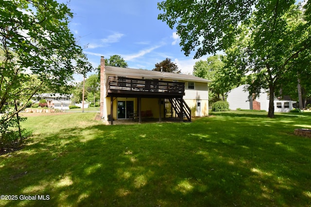 23 Bayberry Dr, Halfmoon, NY 12065 - rear view of house with stairs, a wooden deck, a yard, and a chimney