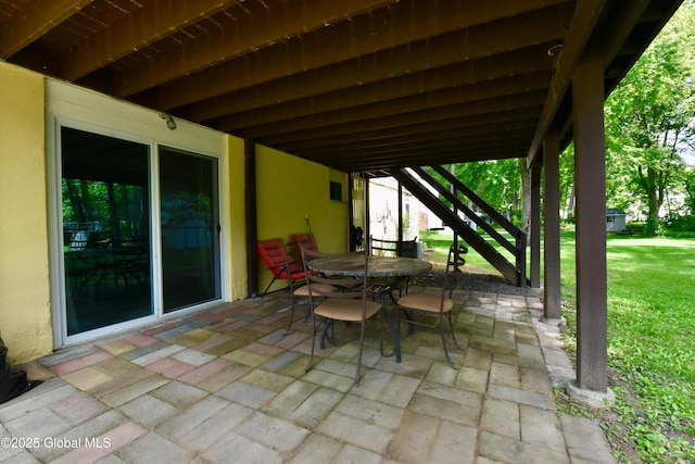 23 Bayberry Dr, Halfmoon, NY 12065 - view of patio / terrace with stairway and outdoor dining space