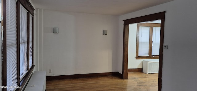 176 Benson St, Albany, NY 12206 - hall with wood finished floors, baseboards, and radiator
