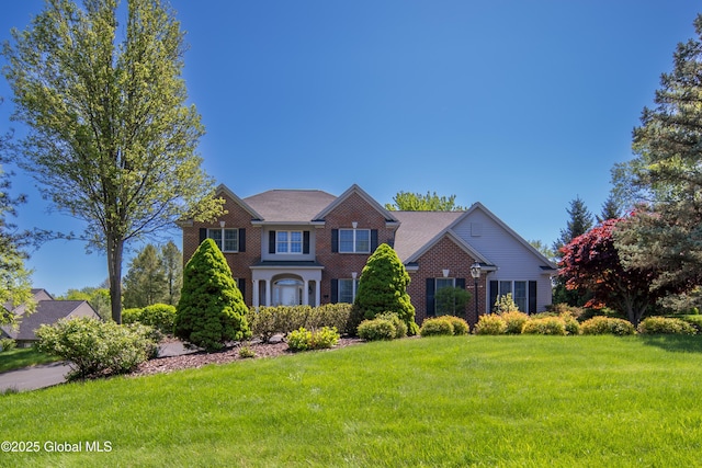 1 Avalon Ct, Colonie, NY 12211 - colonial home with a front yard and brick siding