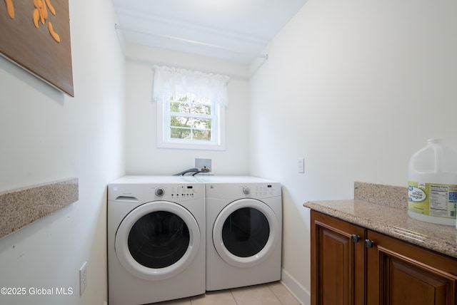 1 Avalon Ct, Colonie, NY 12211 - laundry room featuring washer and dryer, light tile patterned flooring, and cabinet space