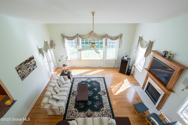 1 Avalon Ct, Colonie, NY 12211 - living area with plenty of natural light, light wood-style floors, and baseboards