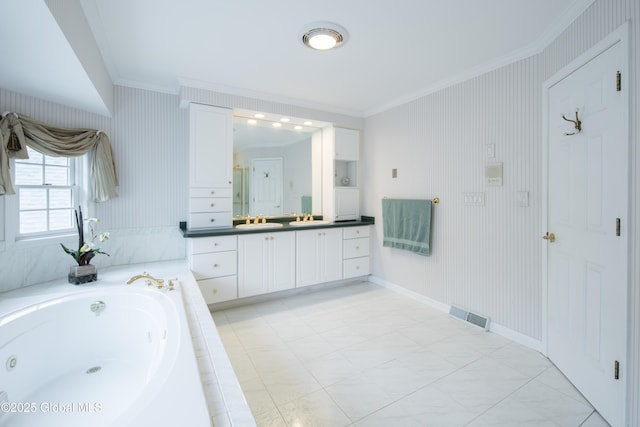 1 Avalon Ct, Colonie, NY 12211 - full bath with ornamental molding, vanity, a jetted tub, and baseboards