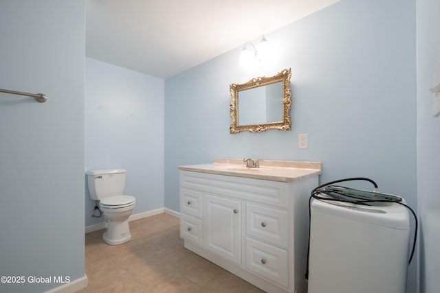 1 Avalon Ct, Colonie, NY 12211 - bathroom with toilet, vanity, baseboards, and tile patterned floors