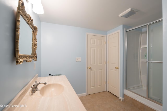 1 Avalon Ct, Colonie, NY 12211 - bathroom featuring a shower stall, tile patterned flooring, vanity, and baseboards