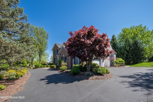 1 Avalon Ct, Colonie, NY 12211 - view of front of house with driveway and brick siding