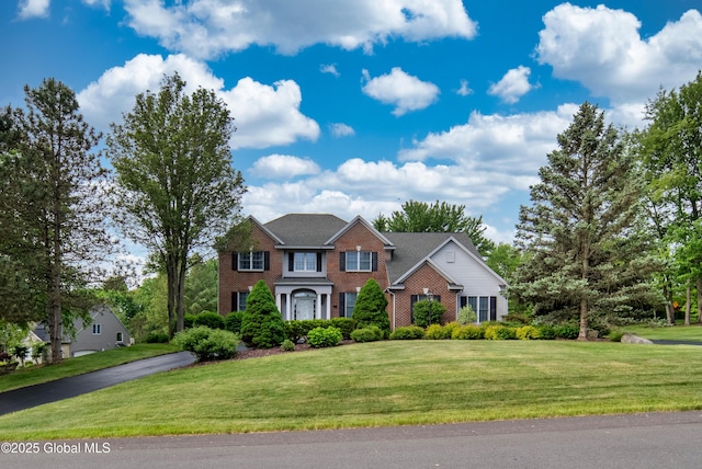 1 Avalon Ct, Colonie, NY 12211 - colonial house with brick siding and a front lawn